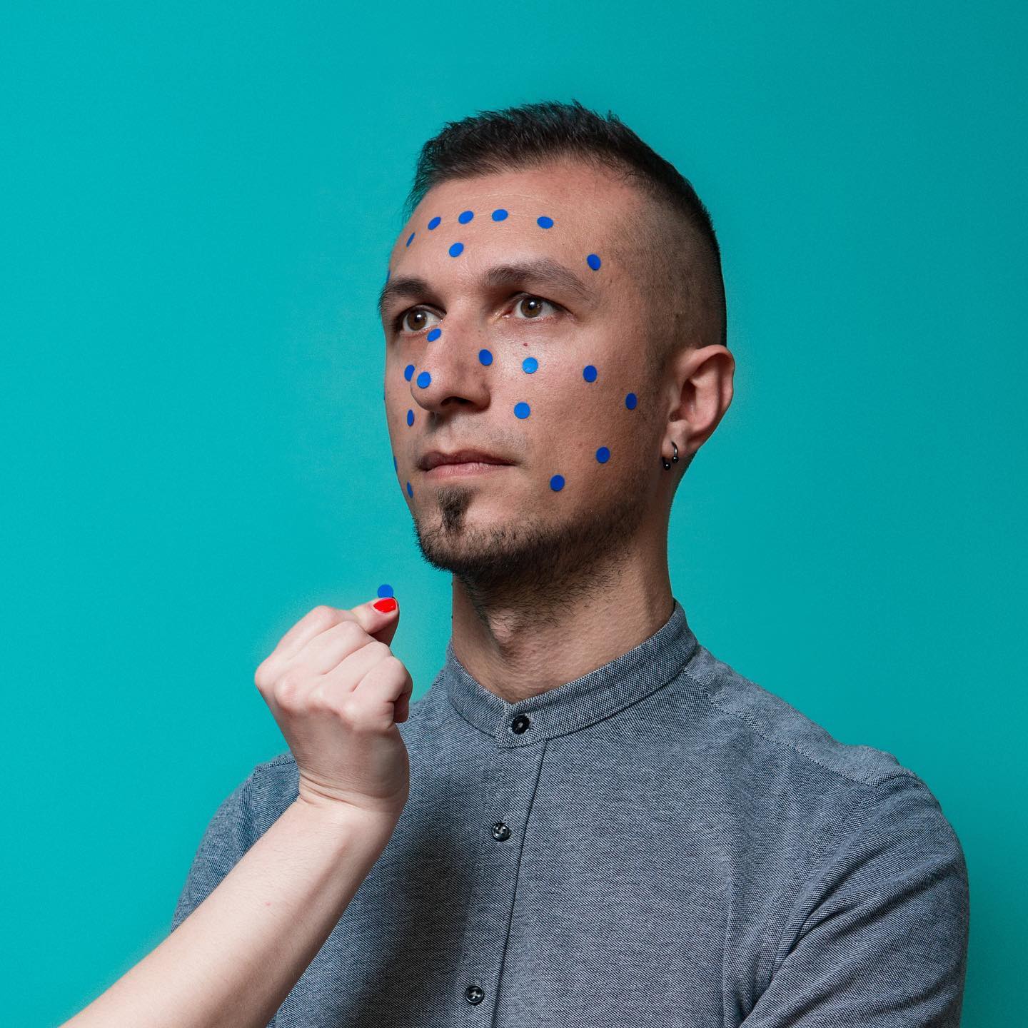 Matteo with voting dots on face